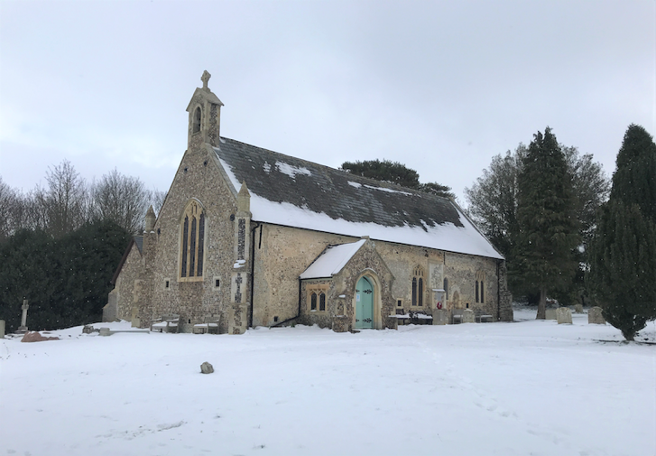 A church in the snow

Description automatically generated with medium confidence