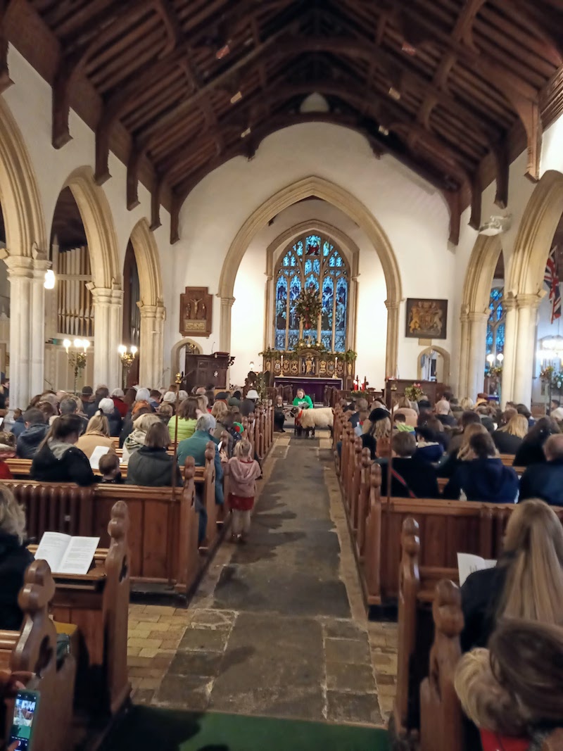 A group of people in a church

Description automatically generated with medium confidence